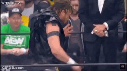 Wrestler In Green AEW Shirt Before Crowd GIF