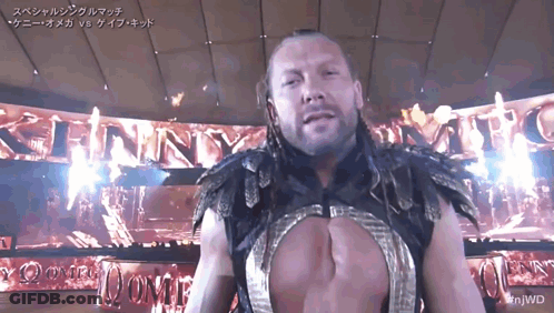 Wrestler In Green AEW Shirt In Front Of Crowd GIF
