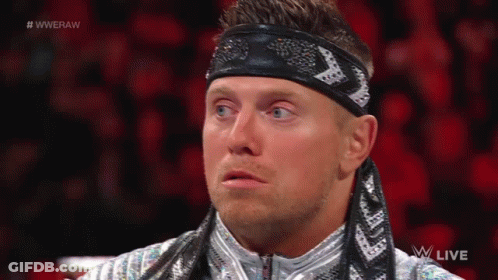 Wrestler In Headband And Silver Jacket GIF