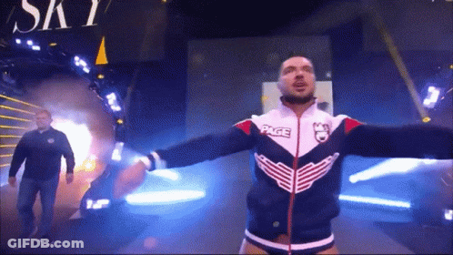 Wrestler In Jacket Saying Page GIF