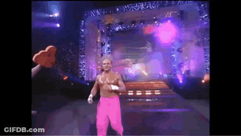Wrestler In Pink Pants Walking Stage GIF