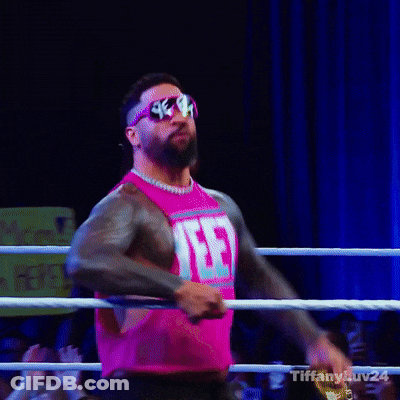 Wrestler In Pink Shirt And Sunglasses GIF