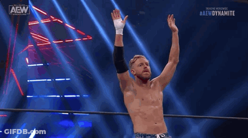Wrestler In Red And Silver Mask In Ring GIF