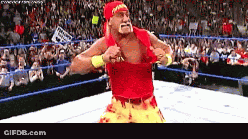 Wrestler In Red Shirt And Yellow Pants GIF