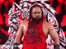 Wrestler In Red Tank Top Facing Tiger GIF