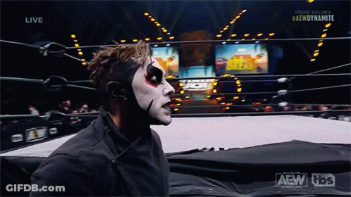 Wrestler In Ring With AEW Dynamite Logo GIF