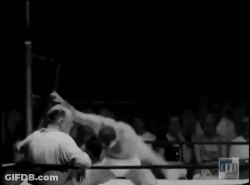 Wrestler In Ring With FFA Logo GIF