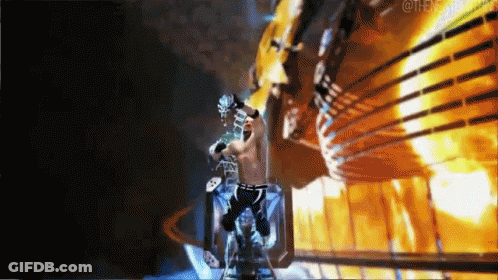 Wrestler In Ring With Fire Background GIF