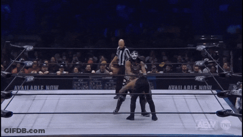 Wrestler In Ring With Number 10 On Shirt GIF