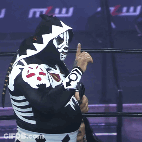 Wrestler In Skeleton Costume Holding Championship Belt GIF