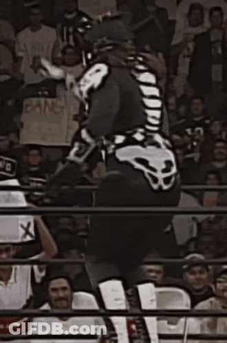 Wrestler In Skeleton Costume Jumping GIF