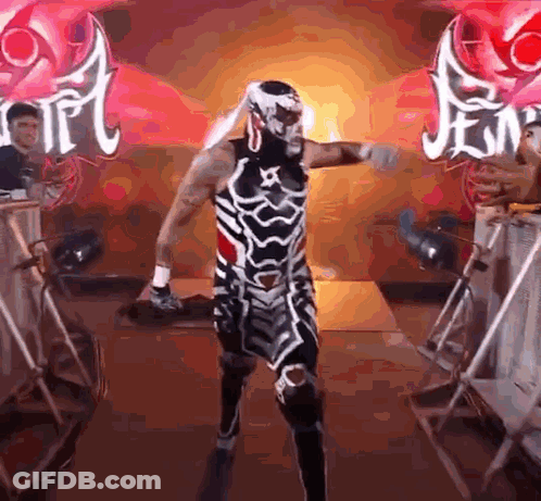 Wrestler In Skeleton Costume Walking Through Crowd GIF