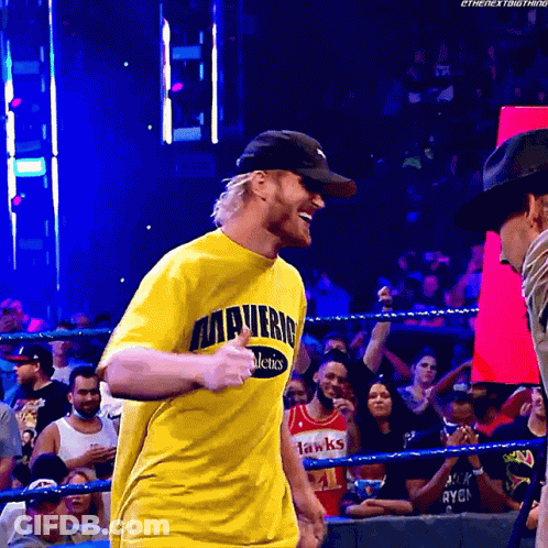 Wrestler In Yellow Mavericks Shirt GIF
