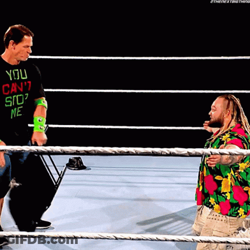 Wrestler In You Can't Stop Me Shirt Talks To Another GIF