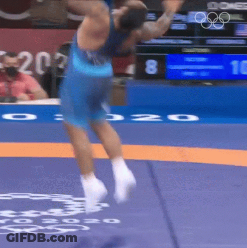 Wrestler Jumping In Front Of Scoreboard 10 GIF
