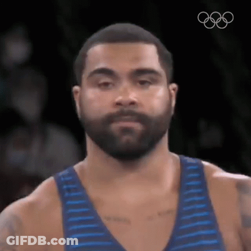 Wrestler Jumping In Front Of Scoreboard With Number 10 GIF