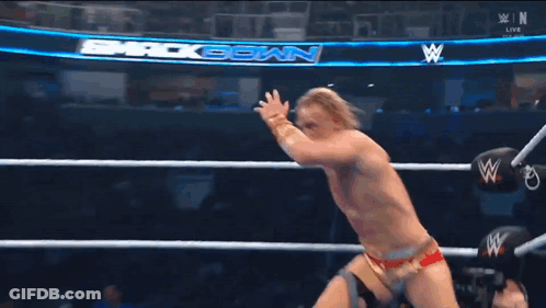 Wrestler Jumping In Ring During Match GIF