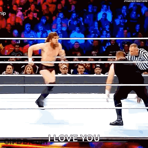 Wrestler Jumping Out Of Ring Referee Watching GIF