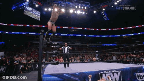 Wrestler Jumping Over Referee In AEW Ring GIF