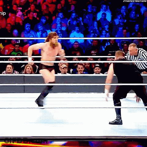Wrestler Jumping Over Referee In Ring #Thenextbigthing GIF