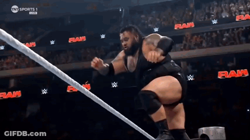 Wrestler Jumping Over Rope During Match GIF