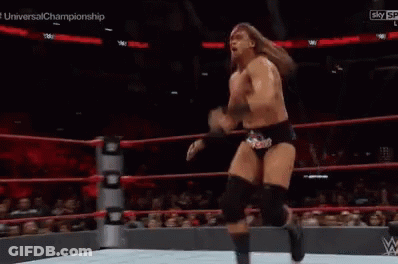 Wrestler Kicking Another Wrestler In Ring GIF