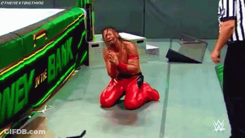 Wrestler Kneeling Green Money In The Bank Banner GIF