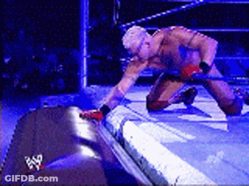 Wrestler Kneeling In Ring GIF