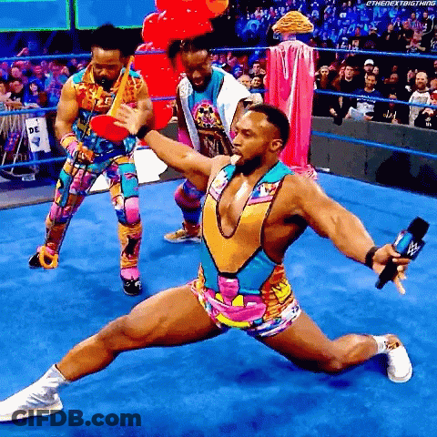 Wrestler Kneeling With Microphone GIF