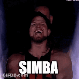 Wrestler Laughing With Simba Chest GIF