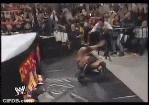 Wrestler Laying On Ground In Wrestling Ring GIF