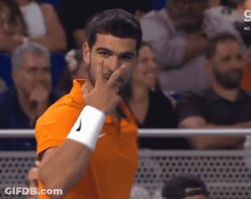 Wrestler Lifted In Air By Another Wrestler In Front Of 403 Sign GIF