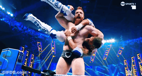Wrestler Lifted In Air By Another Wrestler TNT Sports Advertisement GIF