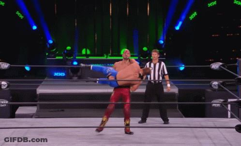Wrestler Lifted Into Air By Another Wrestler GIF