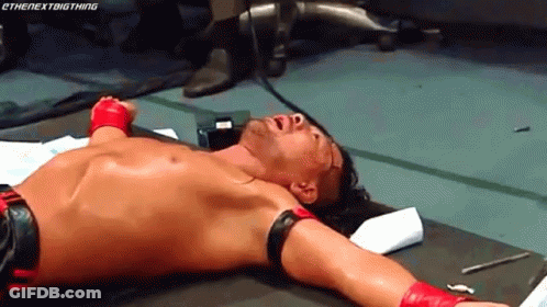 Wrestler Lying Face Down Arms Outstretched GIF