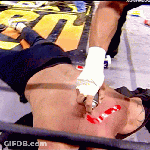 Wrestler Lying On Ground With Next Thing Sticker GIF