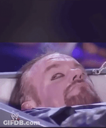 Wrestler Lying On Ring Floor Live GIF