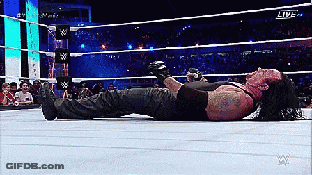Wrestler Lying On Ring Floor GIF