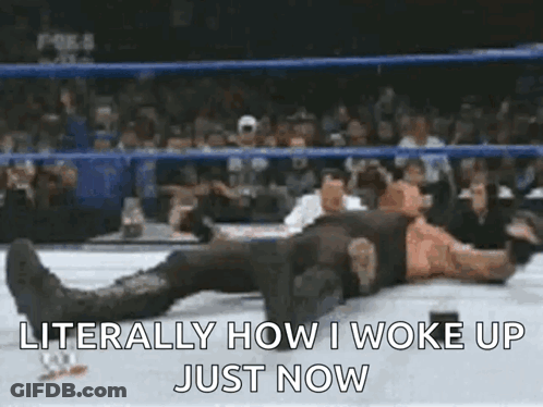 Wrestler Lying On Ring Saying How I Woke Up GIF
