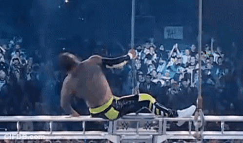 Wrestler Lying On Rope In Ring GIF
