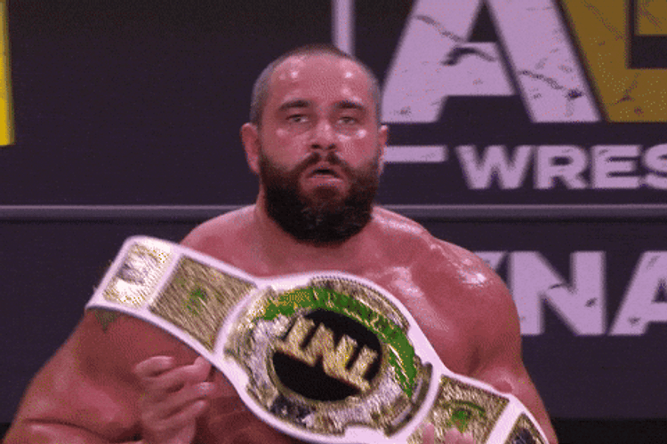 Wrestler Miro Presenting Championship Belt GIF