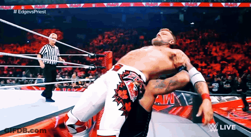 Wrestler Pinned By Another Wrestler With Referee GIF