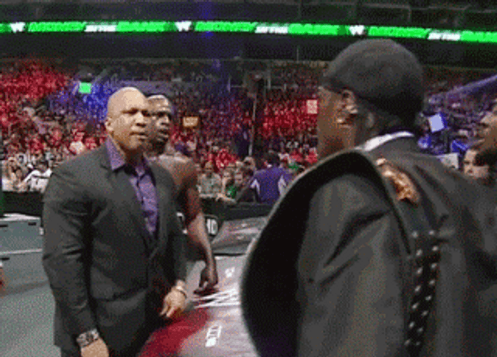 Wrestler R-Truth Tossing Drink GIF
