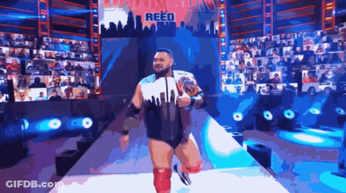 Wrestler Reed Walking Down Arena Aisle GIF