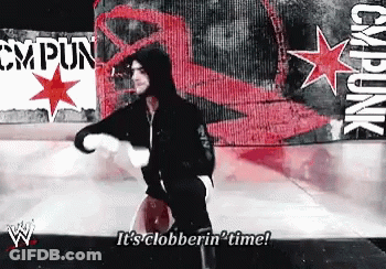 Wrestler Saying Clobberin Time In Front Of CM Punk Banner GIF