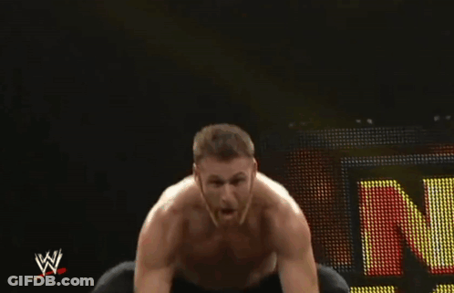 Wrestler Sitting In Front Of Sign N GIF