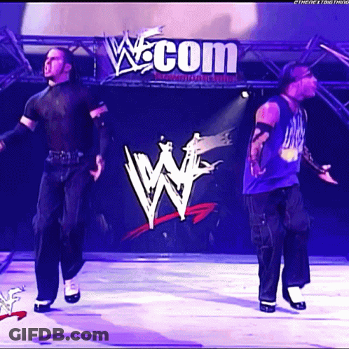 Wrestler Standing On Ladder Holding Rope GIF