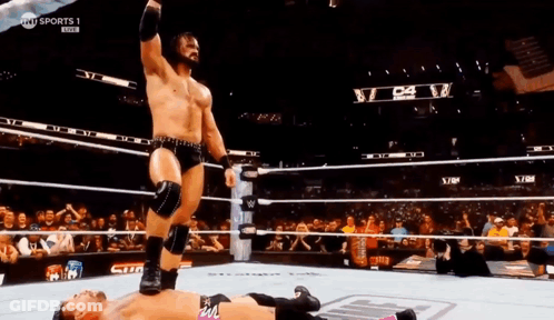 Wrestler Standing On Opponent GIF