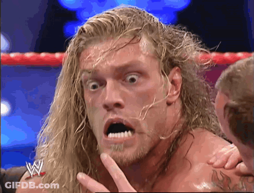 Wrestler Surprised Face In Ring GIF
