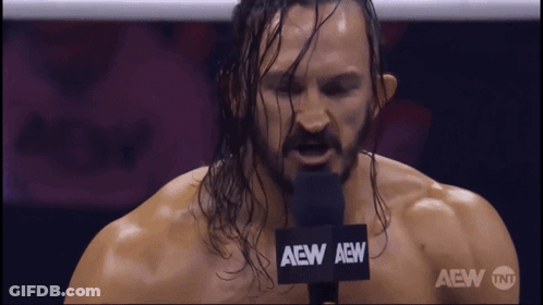 Wrestler Talking Into Microphone Saying AEW GIF